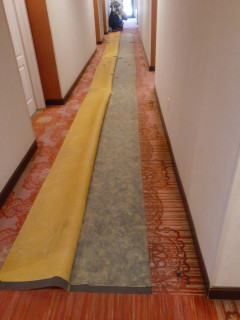 We gently deinstall 3 of 4 sides of the glue down carpet